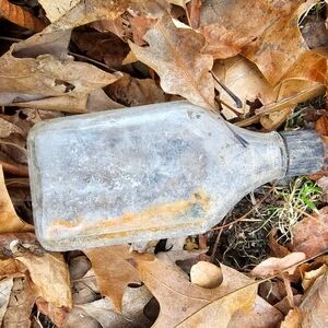 Vintage Glass Bottle with Black Cap